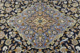 Central medallion detail of 2000s Kashan rug from Iran / Persia