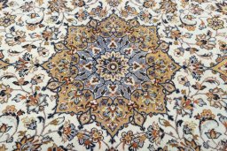 Central medallion detail of 2000s Kashan rug from Iran / Persia