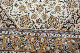 Close-up detail of 2000s Kashan rug from Iran / Persia showing Wool weave