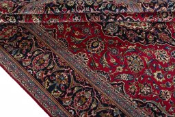 Close-up detail of 2000s Kashan rug from Iran / Persia showing Wool weave