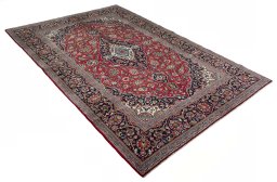 Close-up detail of 2000s Kashan rug from Iran / Persia showing Wool weave