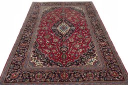 Surface texture of 2000s Kashan rug with natural Wool and intricate pattern