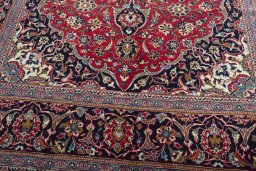 Close-up detail of 2000s Kashan rug from Iran / Persia showing Wool weave