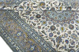 Close-up detail of 2000s Kashan rug from Iran / Persia showing Wool weave