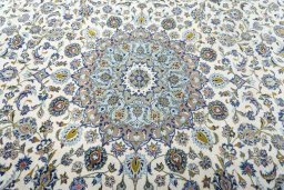 Central medallion detail of 2000s Kashan rug from Iran / Persia