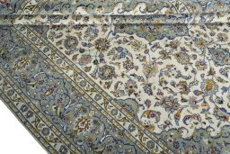 Close-up detail of 2000s Kashan rug from Iran / Persia showing Wool weave