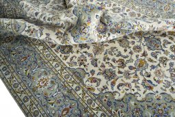 Surface texture of 2000s Kashan rug with natural Wool and intricate pattern