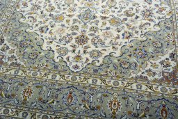 Close-up detail of 2000s Kashan rug from Iran / Persia showing Wool weave