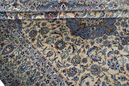 Close-up detail of 2000s Kashan rug from Iran / Persia showing Wool weave