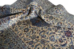 Surface texture of 2000s Kashan rug with natural Wool and intricate pattern