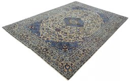 Corner detail of 2000s Kashan rug showing border pattern and Wool pile
