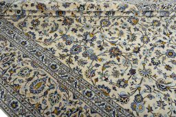 Close-up detail of 2000s Kashan rug from Iran / Persia showing Wool weave