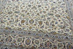 Close-up detail of 2000s Kashan rug from Iran / Persia showing Wool weave