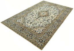 Corner detail of 2000s Kashan rug showing border pattern and Wool pile