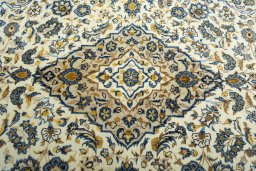 Central medallion detail of 2000s Kashan rug from Iran / Persia