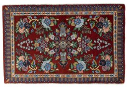 Full view of New Kashan rug from Iran / Persia, 65 × 100 cm in Red tones