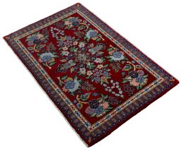 Corner detail of New Kashan rug showing border pattern and Cork pile