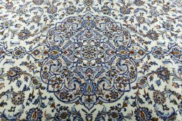 Central medallion detail of 2000s Kashan rug from Iran / Persia