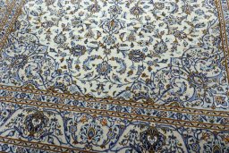 Close-up detail of 2000s Kashan rug from Iran / Persia showing Wool weave