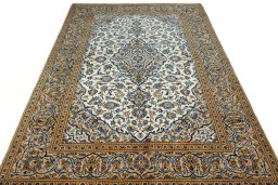 Surface texture of 2000s Kashan rug with natural Wool and intricate pattern
