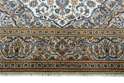 Full view of 2000s Kashan rug from Iran / Persia, 291 × 196 cm in Beige tones