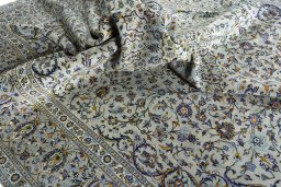 Surface texture of 2000s Kashan rug with natural Cork and intricate pattern