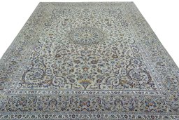 Surface texture of 2000s Kashan rug with natural Cork and intricate pattern