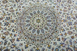 Central medallion detail of 2000s Kashan rug from Iran / Persia