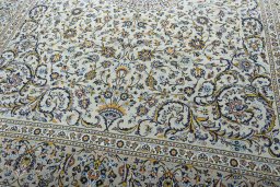 Close-up detail of 2000s Kashan rug from Iran / Persia showing Cork weave
