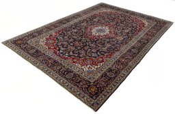 Corner detail of 2000s Kashan rug showing border pattern and Wool pile