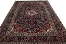 Surface texture of 2000s Kashan rug with natural Wool and intricate pattern