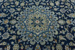 Central medallion detail of 2000s Kashan rug from Iran / Persia