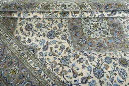 Close-up detail of 2000s Kashan rug from Iran / Persia showing Wool weave