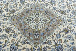 Central medallion detail of 2000s Kashan rug from Iran / Persia