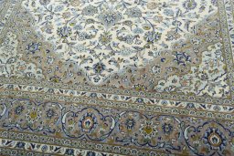 Close-up detail of 2000s Kashan rug from Iran / Persia showing Wool weave