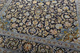 Close-up detail of 2000s Kashan rug from Iran / Persia showing Wool weave
