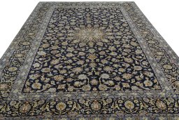 Surface texture of 2000s Kashan rug with natural Wool and intricate pattern
