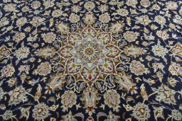 Central medallion detail of 2000s Kashan rug from Iran / Persia