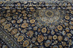 Close-up detail of 2000s Kashan rug from Iran / Persia showing Wool weave