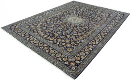 Corner detail of 2000s Kashan rug showing border pattern and Wool pile