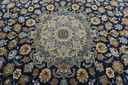 Central medallion detail of 2000s Kashan rug from Iran / Persia