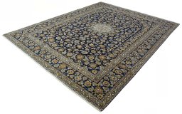 Corner detail of 2000s Kashan rug showing border pattern and Wool pile