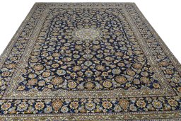 Surface texture of 2000s Kashan rug with natural Wool and intricate pattern