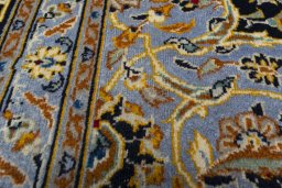 Central medallion detail of 2000s Kashan rug from Iran / Persia