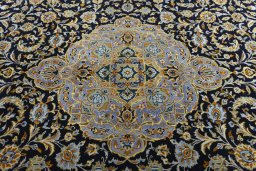 Central medallion detail of 2000s Kashan rug from Iran / Persia