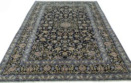 Surface texture of 2000s Kashan rug with natural Wool and intricate pattern
