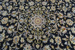 Central medallion detail of 2000s Kashan rug from Iran / Persia