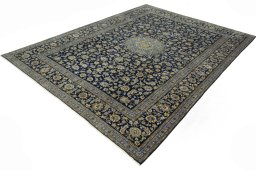 Corner detail of 2000s Kashan rug showing border pattern and Wool pile