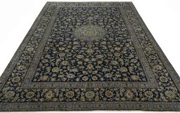 Surface texture of 2000s Kashan rug with natural Wool and intricate pattern