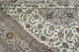 Close-up detail of 2000s Kashan rug from Iran / Persia showing Wool weave